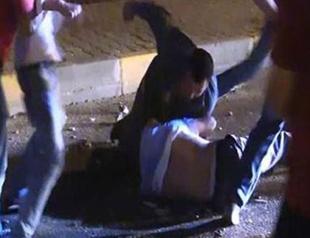 Footage shows group beating man wounded by bullet during Kobane protests in İzmir