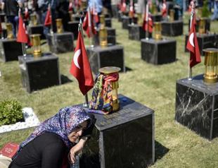 Families flock to the graves of Soma victims on first anniversary of Turkey’s deadliest mining accident