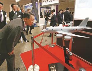 Japan’s Cabinet endorses bills to allow greater defense role