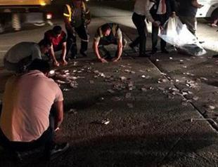 Banknotes scattered across Istanbul’s Atatürk Airport