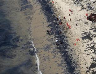 Governor declares emergency as California cleans oil spill