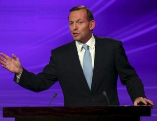Australia PM rules out resettling Asian boat migrants