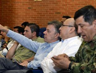 Colombia air strike kills 18 FARC rebels as talks resume