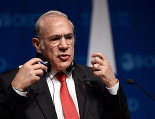 OECD calls US dip a blip, but chops world growth forecast