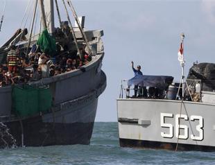 Myanmar lands 700 migrants, US says Rohingya should be citizens