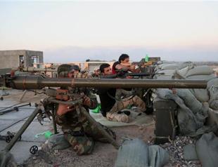 Iraq needs more airstrikes to dislodge ISIL in Tikrit: officials