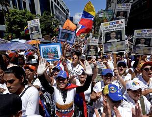 Venezuelans mass for years largest anti-government protests
