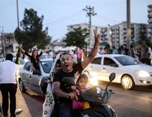 Fireworks, gunfire as Kurds fete Turkey poll breakthrough