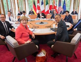G-7 warns Russia of more sanctions, pledges climate action