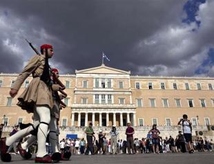 Greece delivers reform plan to EU, warns on cost of failure
