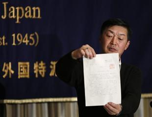 Japan journalists new passport bans travel to Iraq, Syria