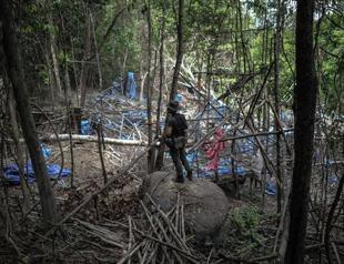 Malaysian police reveal grim secrets of jungle trafficking camps