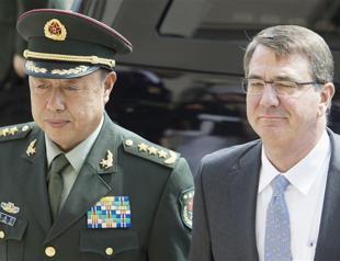 Pentagon chief urges China to stop island building