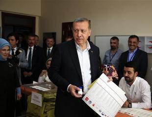 Turkish president casts his vote in parliamentary elections, says high election turnout across country
