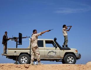 Rival Libya militants fight ISIL amid suicide bombings