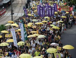 Hong Kong democracy groups take to streets as key vote looms