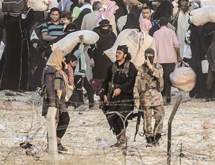 Turkey sees new refugee influx with ISIL at border