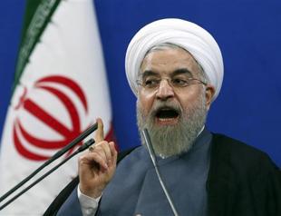 Irans Rouhani says critics belittle sanctions impact