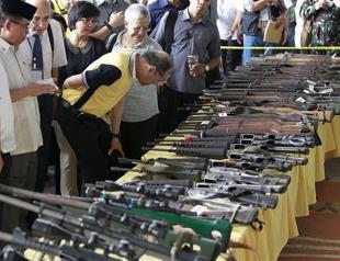 Philippine Muslim rebels hand over weapons to Turkey-led decommissioning body