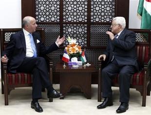 Abbas sees no place for Hamas in new govt, says French FM