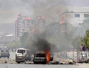 Taliban suicide bomber, gunmen attack Afghan parliament