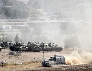 Kurdish forces expel ISIL fighters from Syrian border town