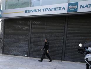 Greece, EU duel over referendum as crisis deepens