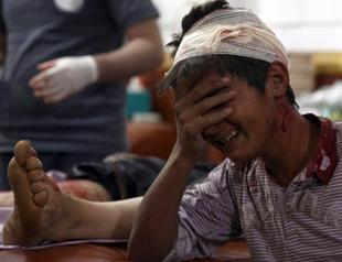 Syria regime raids kill 10 in Damascus suburb: monitor