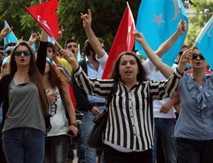 Turkey probes attack on Koreans, China rules out Uighur discrimination