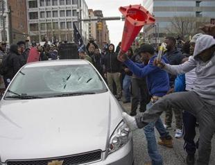 Violence mars Baltimore protest over police custody death