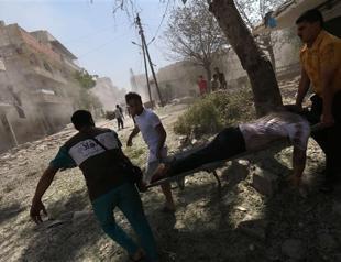 Barrel bombs kill 11 civilians in ISIL town in Syria