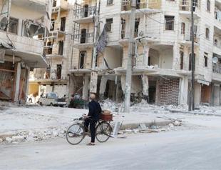 13 dead in Syria regime raids on ISIL-held town