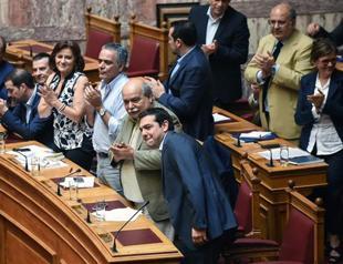 New Greek ministers sworn in after Tsipras cabinet reshuffle