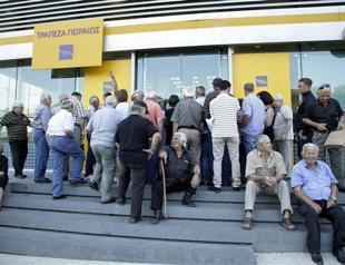 Banks reopen in Greece after three-week shutdown