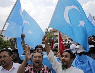 China holds Uighur who planned bomb attack: report