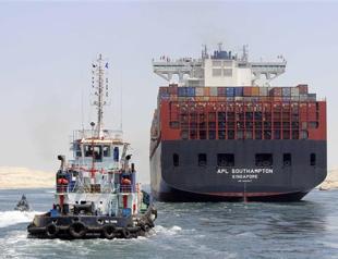Ships cross Egypts New Suez Canal in first test-run