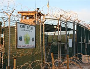 Some Guantanamo inmates would go to U.S. under new plan: Obama aide