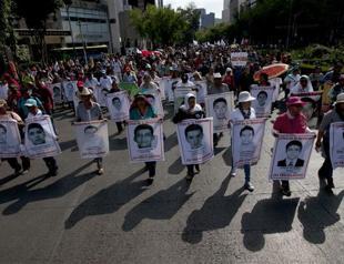 Mexico search for missing students turns up 129 bodies