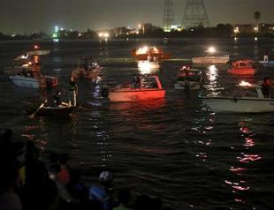 21 dead as cargo ship hits party boat north of Cairo