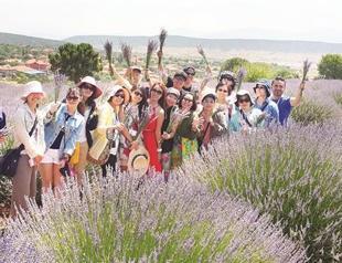 Asian tourists taking cultural tours in Antalya, ecological tours in Isparta