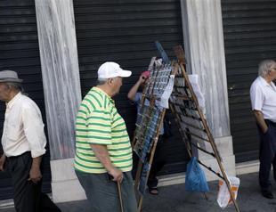 IMF paints dim picture for Europe, suggests more money printing may be needed