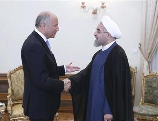 France seeks to warm up Iran ties with Rouhani invite