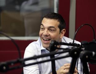 Greek PM warns hardliners with snap vote to approve reforms