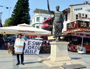 Turkish man protests alcohol sale restrictions in unusual demo