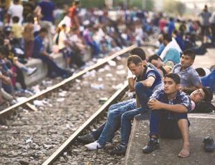 Juncker urges EU members to resist ‘populist’ rejection of migrants