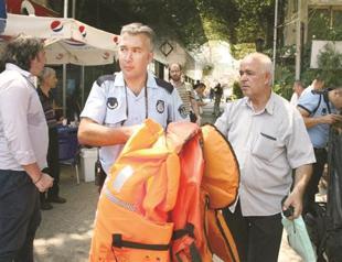 Police collect substandard life vests from Syrian migrants