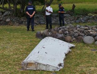 Malaysia confirms wing part washed up on beach is from missing MH370