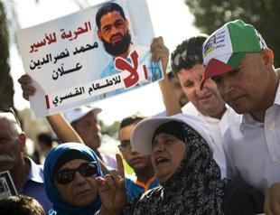Hunger-striking Palestinian prisoner in coma: Lawyer