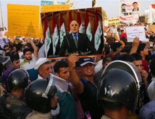 Iraqs Abadi, in reform push, reduces ministerial adviser positions