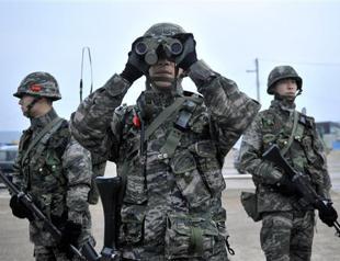 South Korea fires rounds at North in response to shell